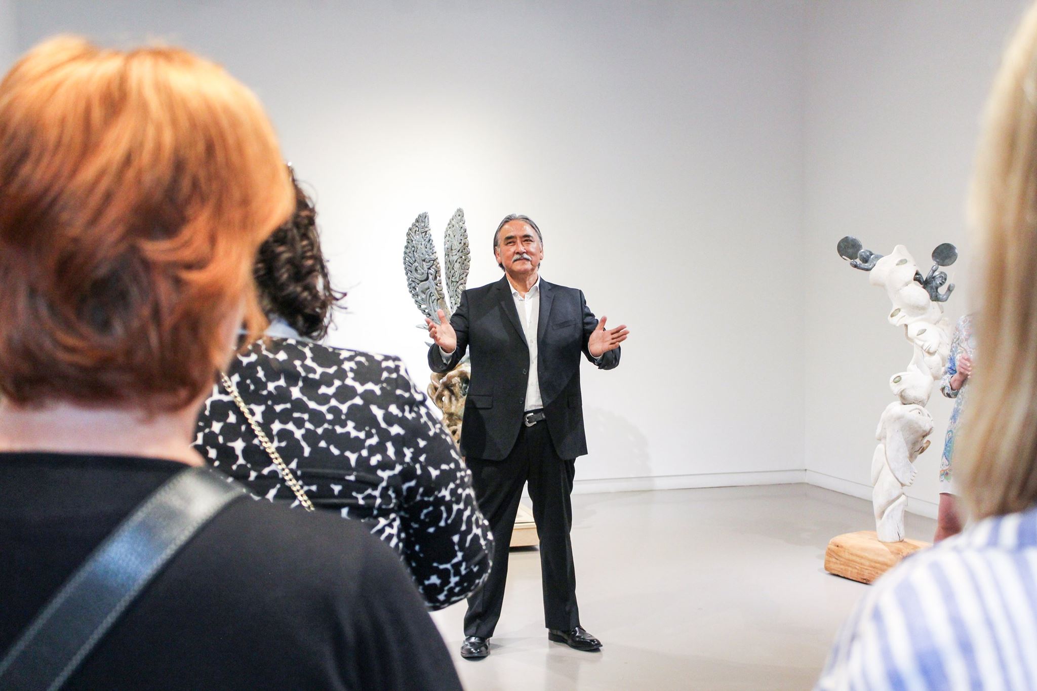 Abraham Anghik Ruben gives an exhibition opening talk at Feheley Fine Arts in Toronto