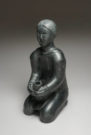 WOMAN HOLDING CUP