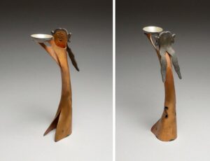 WOMAN OFFERING BOWL
